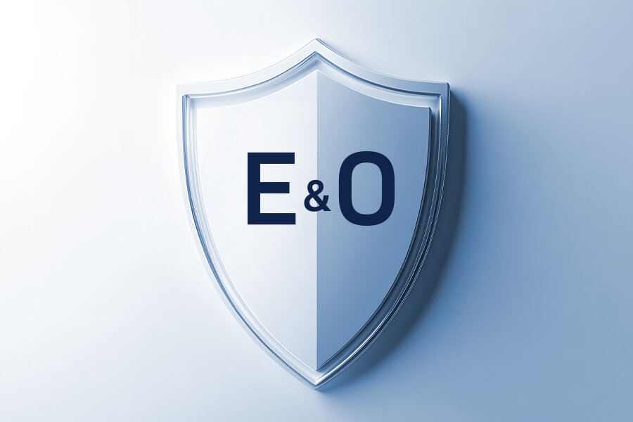 White shield logo with E&O text against a light blue background.